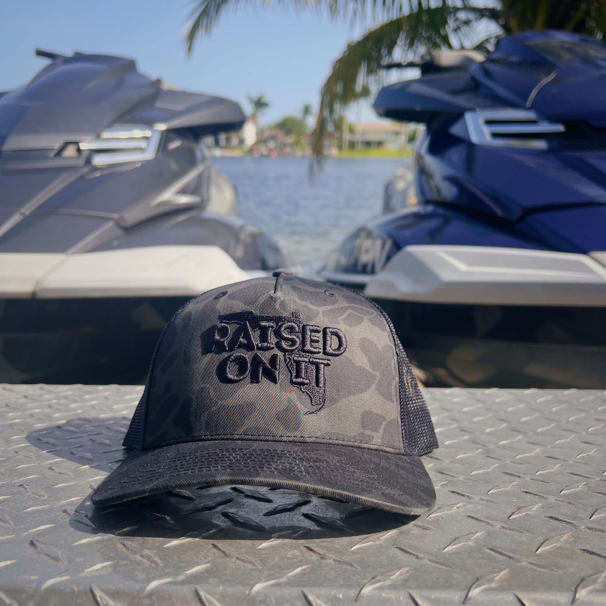 Raised On It | Florida Logo | Embroidered Trucker Hat
