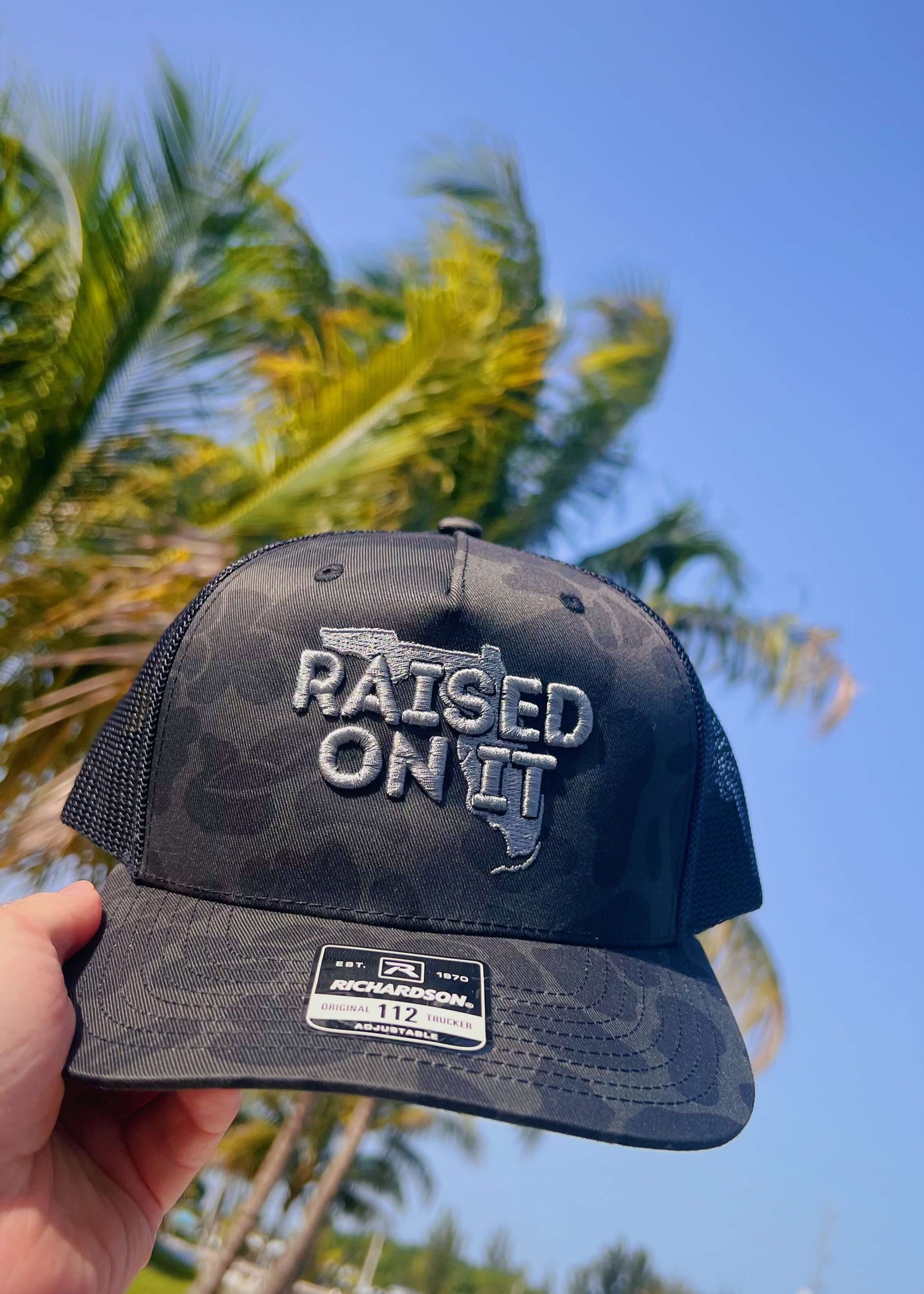 Raised On It | Florida Logo | Embroidered Trucker Hat